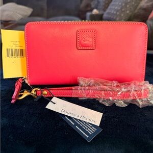 Dooney & Bourke Florentine large zip wallet. Fuchsia. New